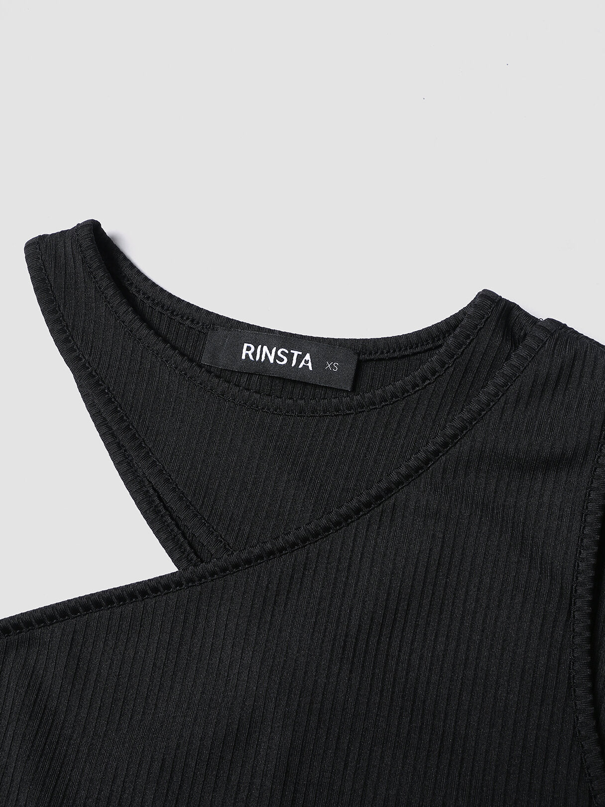 Solid Asymmetrical Cut Out Crew Neck Crop Top